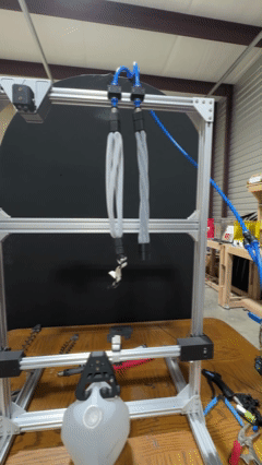 A braided pneumatic muscle contracting on a test bench